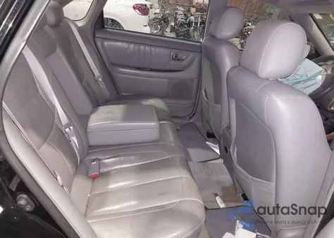 2000 Toyota Avalon Xls z USA, uszkodzony, nr VIN 4T1BF28B9YU071089